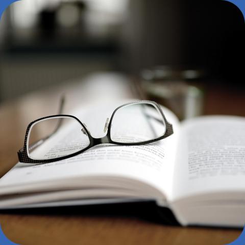 Reading glasses on a book for Christian Römmer (IBM and the Holocaust)